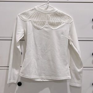 Small white long sleeve shirt